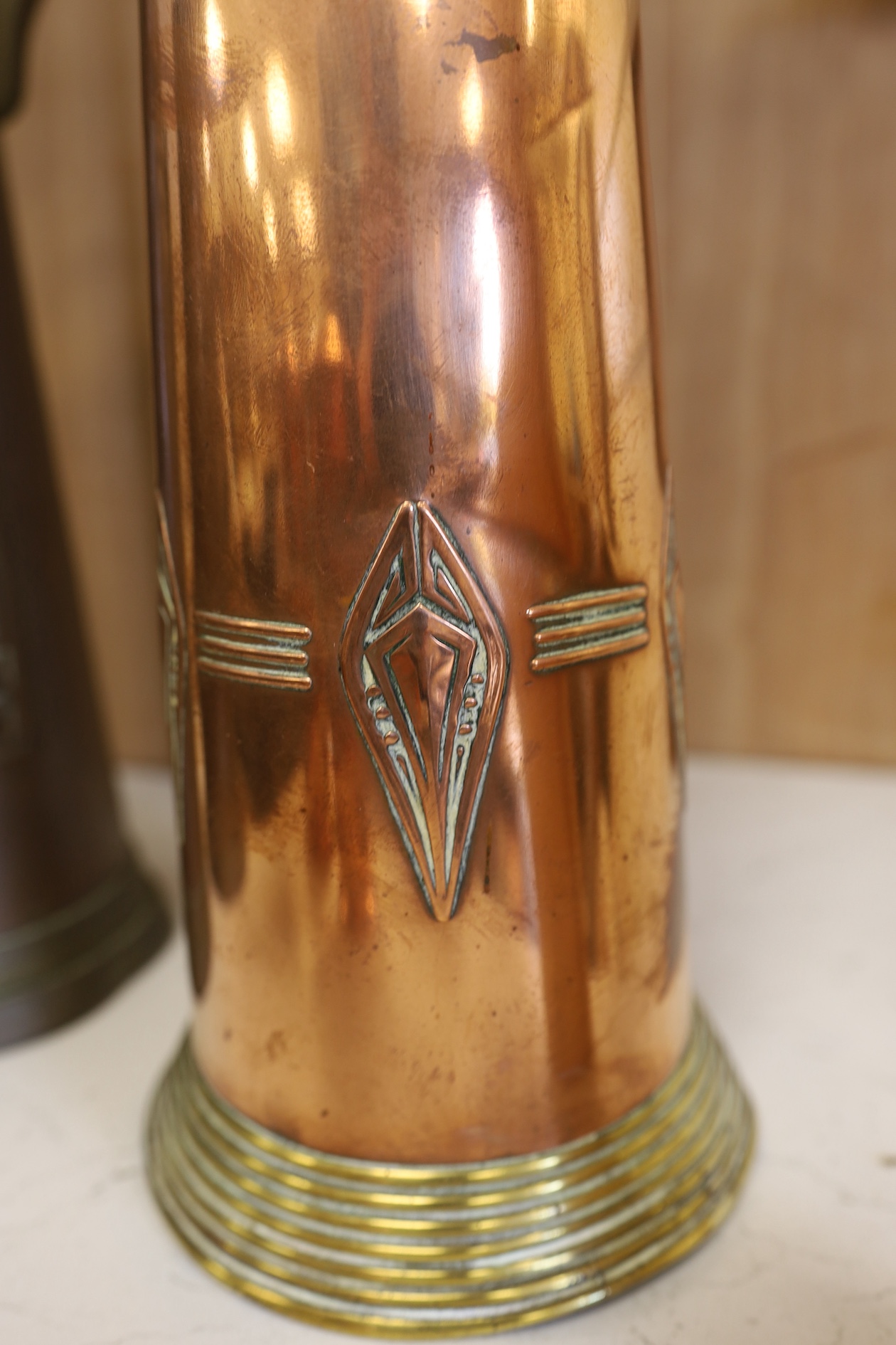 Three Art Nouveau mixed copper and brass coffee pots and two individual copper filter coffee glasses, tallest 36cm high (5). Condition - two pots need cleaning, but good condition for age